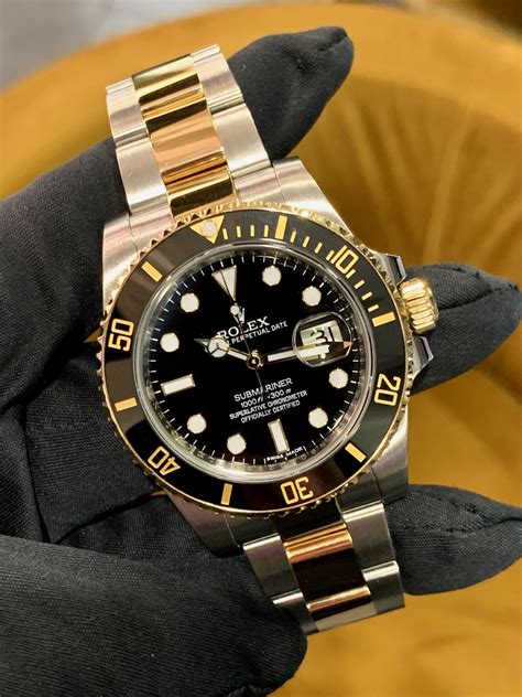 rolex submariner gold and stainless.